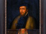 un tableau représentant un homme barbu avec des armoiries