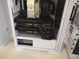 a computer case with a fan and a hard drive in it