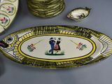 a plate with a picture of a man and a woman on it