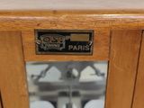 a close up of a wooden table with a label on it