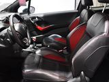 the interior of a car with red and black leather seats