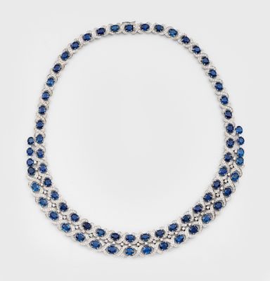 a sapphire and diamond necklace, by person