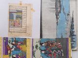 a picture of a collection of old books on a table