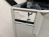 a picture of a small trash can with a sign on it