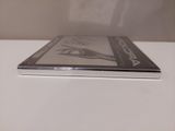a picture of a cd on a white table