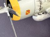 a model of a small airplane with a propeller