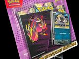 un gros plan d'une boîte de cartes Pokémon sur fond noir