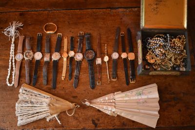 many different types of jewelry on the table