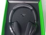 xbox wireless headphones in a box with a green lid