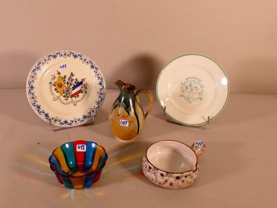 many different plates and bowls sitting on a table