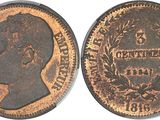 a close up of a coin with a man ' s head on it