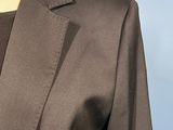a close up of a woman ' s jacket on a mannequin mannequin