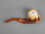 an image of a pipe with a cord attached to it