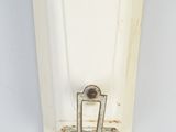 a white light that is on the wall in the room