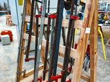 many tools on a wooden stand in a building