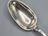 a spoon that is sitting on a table