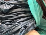 a pile of garbage sitting on the floor in a room