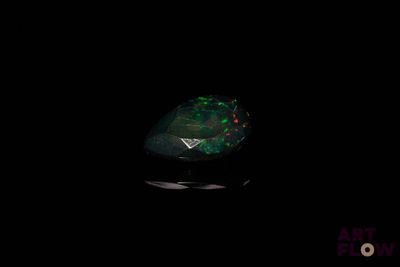 a green oplite in the dark
