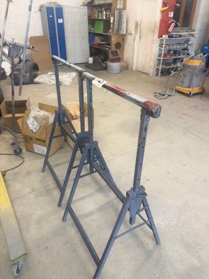 a picture of a garage with a lot of tools on the floor