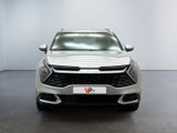the front view of a silver suv parked in a white room