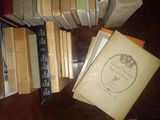 a lot of books that are on the table