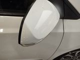 a close up of a car ' s side mirror on the side of the car