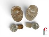 two glass jars and a cork stopper on a white surface
