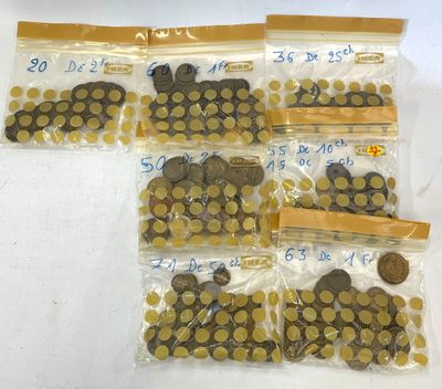 a lot of coins in the bags on the table