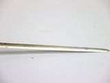 an image of a metal spoon with a long handle
