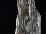 statue of a woman holding a baby in her arms