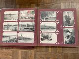 a book with pictures of people on it sitting on a table