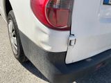 a close up of the rear end of a white truck