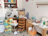 a room with a lot of boxes and boxes on the floor