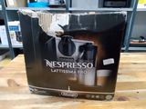 a box of nespresso lattissima pro products on a table