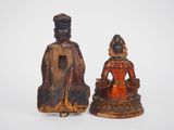 pair of carved wood figures of a seated buddha and a seated buddha