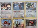 beaucoup de cartes pokemon sur le mur