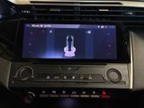 a picture of a car dashboard with a digital display