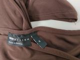 a close up of a brown pants with a label on it