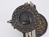 a close up of a vintage typewriter with keys attached to it