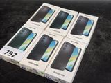 six boxes of samsung galaxy a9s are stacked on a table