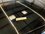 an image of a glass table with a sign on it