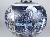 a vase with a picture of a woman and a man on it