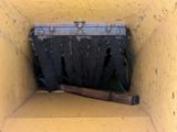 a baseball bat sticking out of a hole in the wall