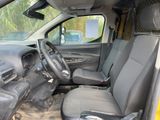 the interior of a car with a steering wheel and a steering wheel