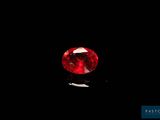 a red diamond on a black background