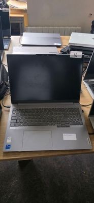 two laptops that are sitting on a table