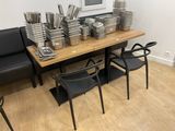a table with a lot of plates and pans on it