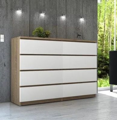 an image of a white and wood dresser in a living room