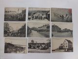 several old black and white photographs of people on a street