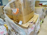 many boxes stacked on top of each other in a warehouse